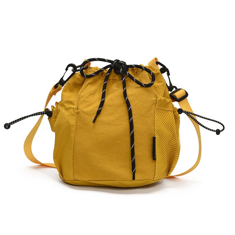 

New bucket bag pull rope pleated casual versatile shoulder summer bag women s niche Korean version messenger bag жёлтый
