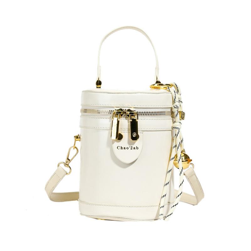 Retro simple small bag women's 2025 spring new portable bucket bag high-grade texture versatile commuter messenger bag