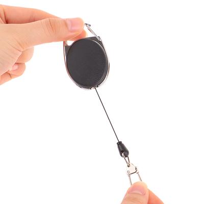 Zatahovací držák odznaku s navijákem na klíče s rychloupínací pružinou Rybářské příslušenství