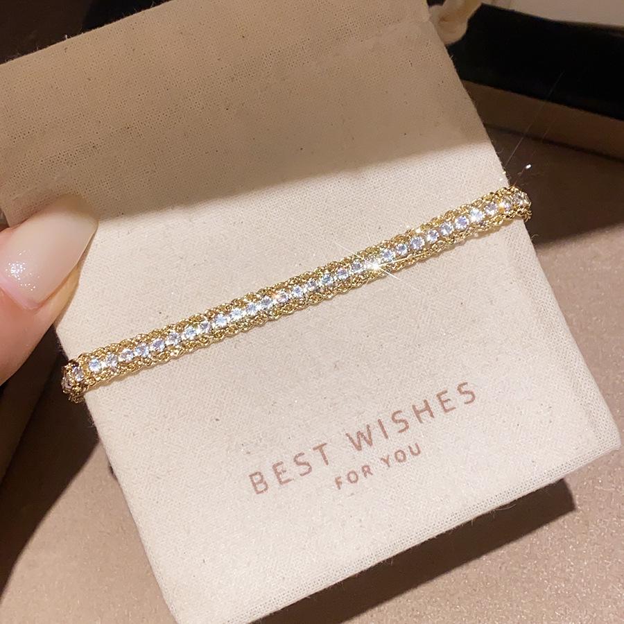 Plaid Gold Bracelet with Shiny Zirconia Ring – Luxurious, Fashionable, and Versatile Ins Style Jewelry.