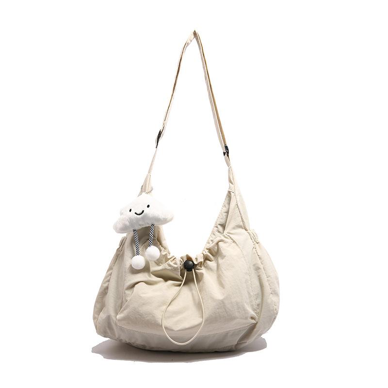 Fashion drawstring messenger bag women's new versatile pleated shoulder bag large-capacity student sports and leisure bag