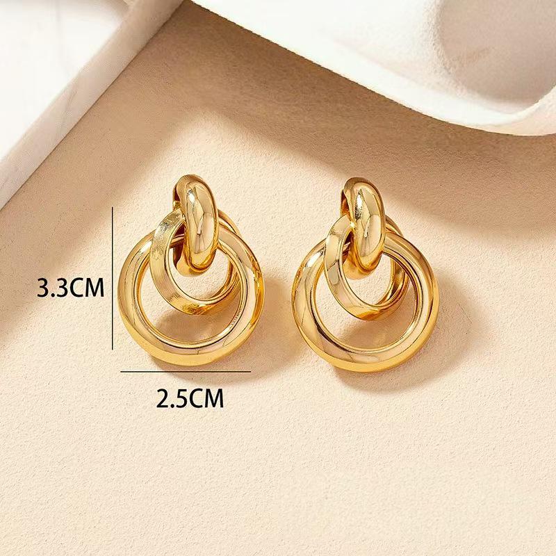 Gold-Tone Geometric Twist Earrings: Fashionable and Versatile Multi-Layer Braided Earrings for Women.