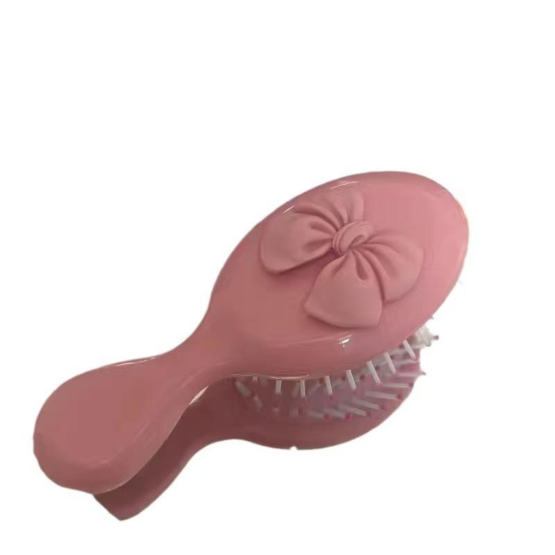 

Portable Mini Folding Air Cushion Bow Comb with Massage Feature