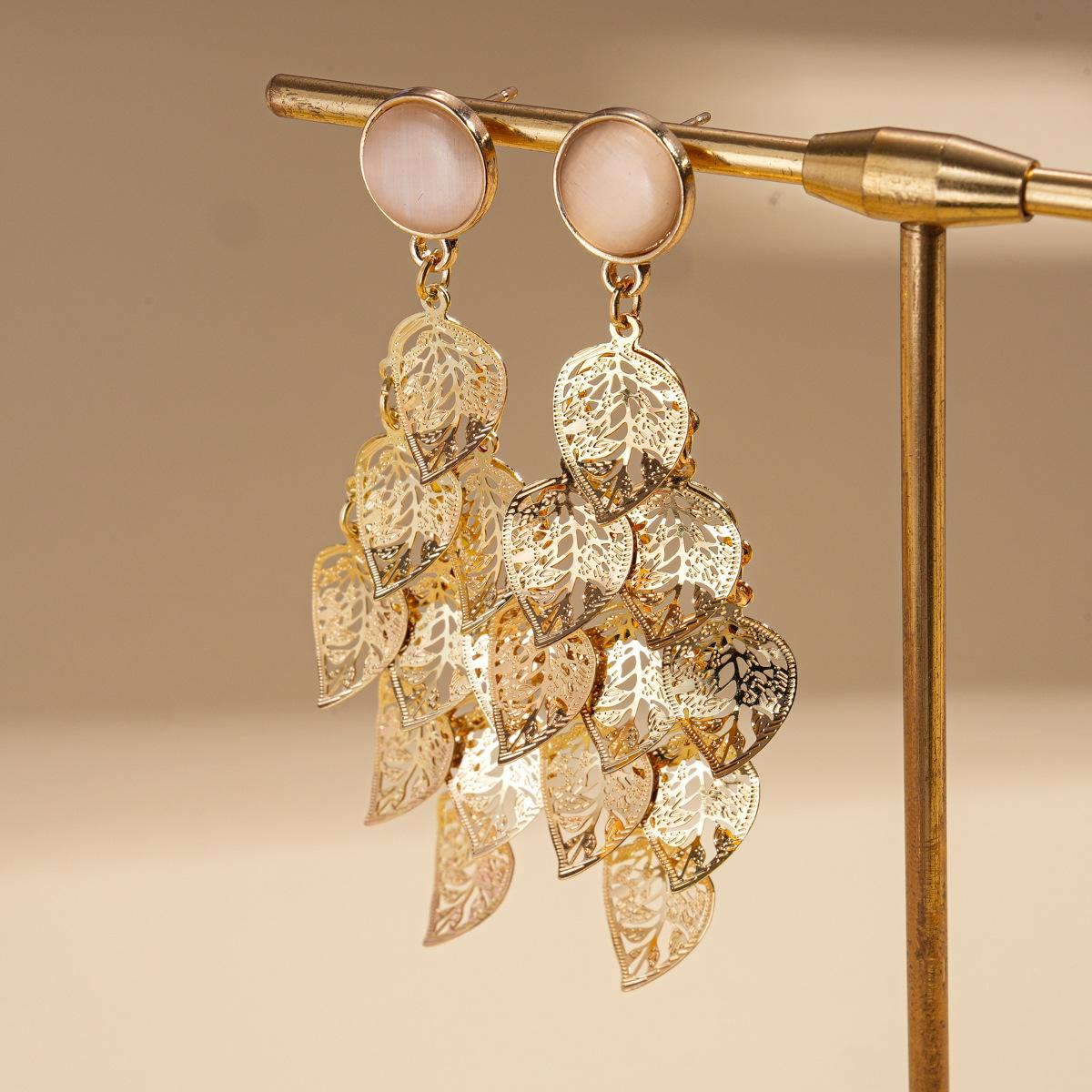 Metal opal hollow leaf fringed silver needle earrings temperament earrings