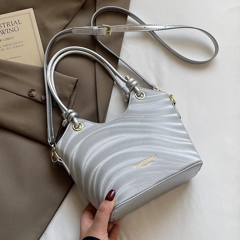 Wholesale New Product Premium Wave Pattern Simple Portable Bucket Bag Women's Leisure Work Commuter Versatile Messenger Bag