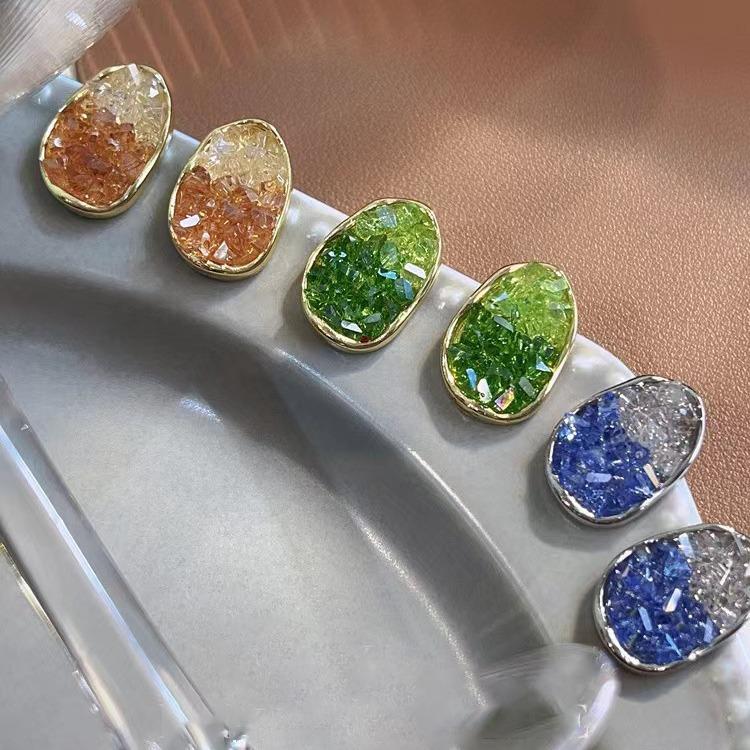 Fresh and elegant crystal earrings in orange, sea blue and green pastel gradient colors. Women's light luxury and fashionable earrings.