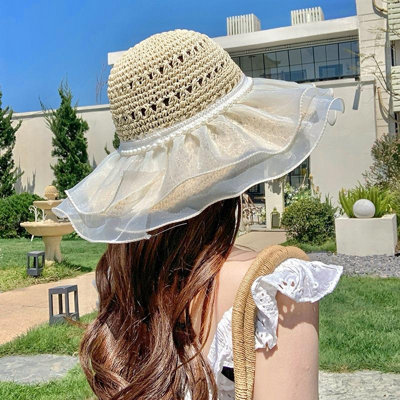Hyunya wind colored wood beads straw hat women's summer big brim straw bucket hat foldable seaside sunshade sunscreen hat