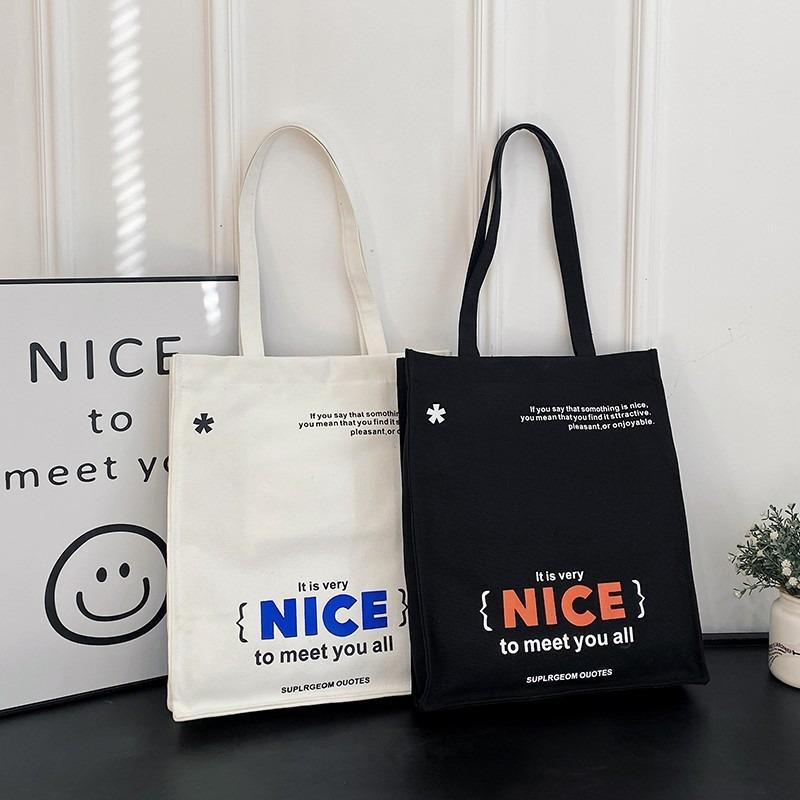 Modieuze draagtas Nieuwe vrouwelijke student make-uptas Canvas tas Dagelijkse pendeltas Grote capaciteit okseltas