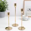 Elegant European Candle Holder Set: Electroplated Three-Piece Metal Ornament for High-End Dining and Wedding Décor.