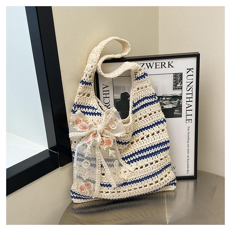 Shoulder bag women's spring and summer new straw woven tote bucket bag hollow large capacity underarm bag woven bag