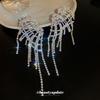 Silver needle with diamond wings hollow fringed earrings European and American exaggerated earrings temperament light luxury earrings women
