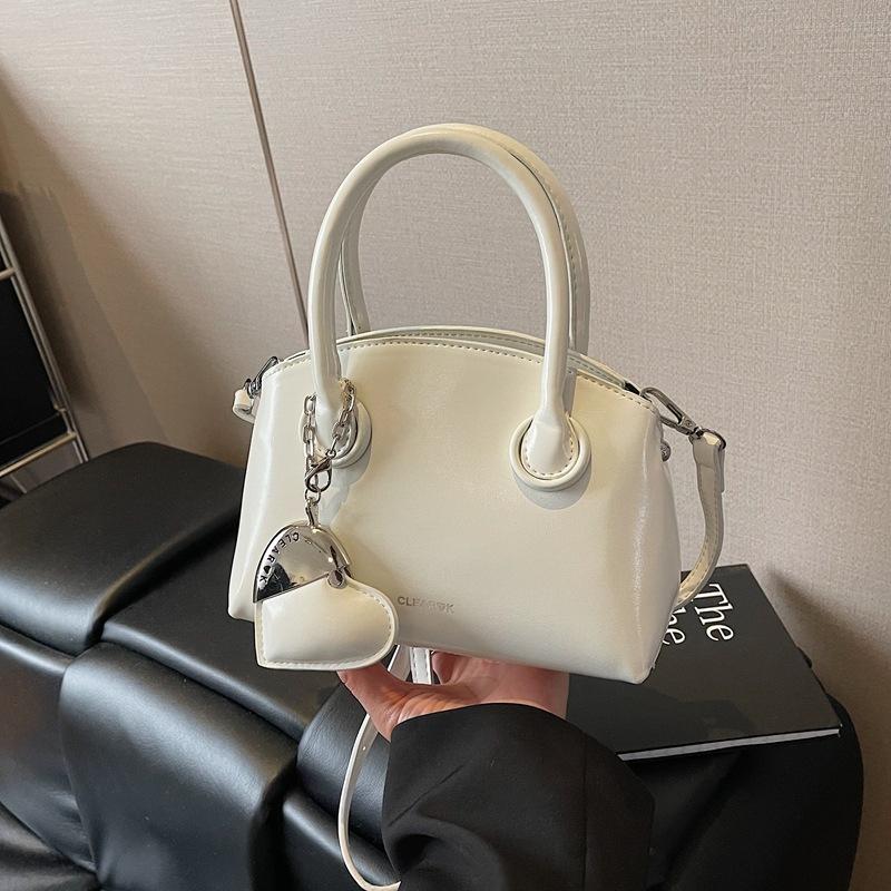 Niche Fashion Hand-carried Shell Bag Women's New Versatile Shoulder Bag Simple Casual Messenger Bag