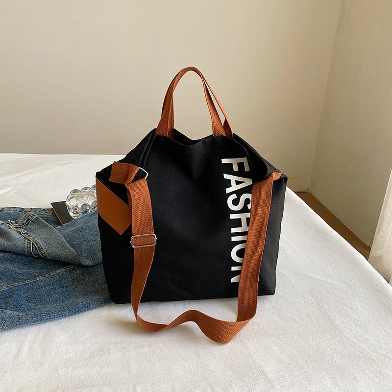 Eye-catching Large Capacity Canvas Tote Bag With Inner Pocket For Practical Daily Use And Commuting