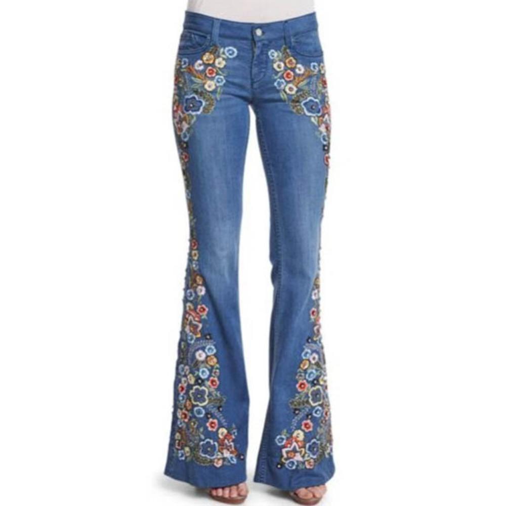 Jeans ricamati slim-fit lavaggio svasati donna
