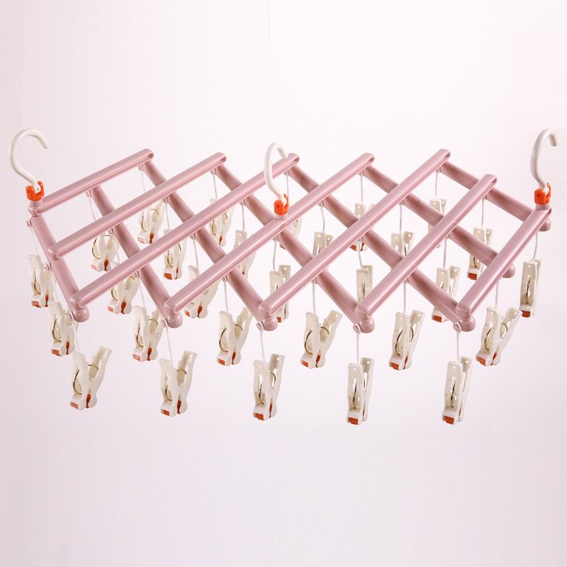 Multi-Functional Retractable Windproof Clothes Drying Rack with Seamless 3D Design and Storage Clips