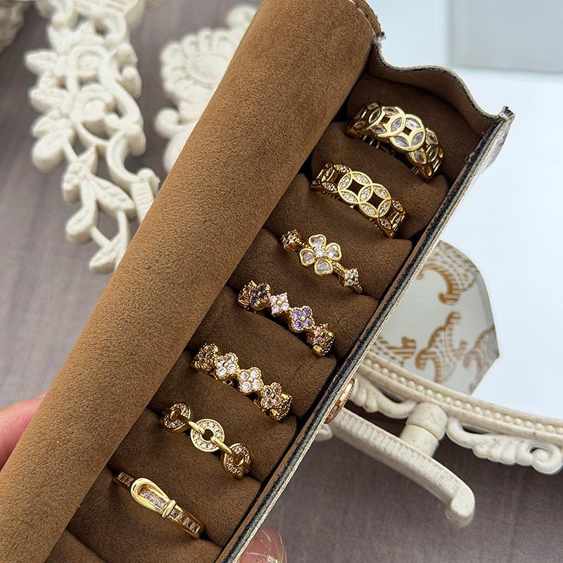 Retro Light Luxury Goldkette Hohl Vierblättriges Kleeblatt Diamantbesetzt Zirkon Kupfer Münze Gürtelschnalle Öffnungsring Nische Stapelring