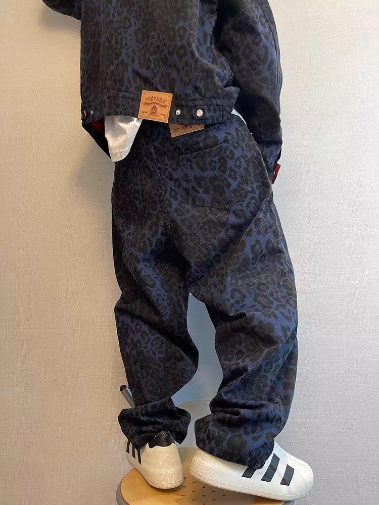 Americká vysoká pouliční móda: Pánské volné džíny s koženou výšivkou - Zimní trend, široký střih.