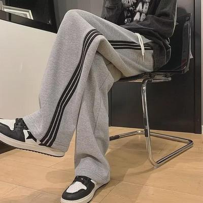 Pantalon de survêtement ample à rayures pour homme, style coréen décontracté - Tendance printemps/automne à neuf points, style Hong Kong