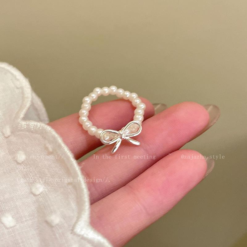 Bow pearl beaded ring women's ins niche design decorative open ring light luxury high sense stacked ring