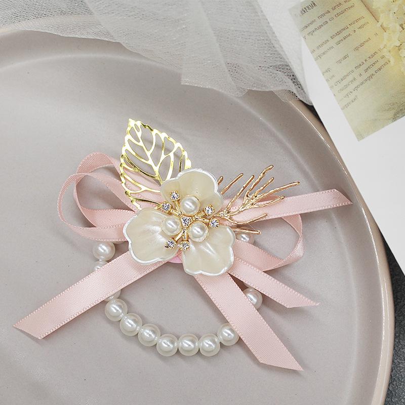 

Fresh Bridal Wrist Corsage Set: Elegant Hand Flowers for Bridesmaids, Bride, Groom, and Best Man.