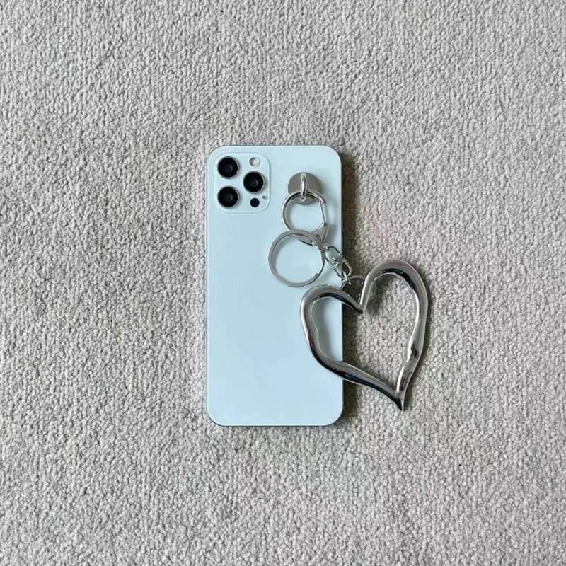 Unique Heart Shaped Keychain with Elegant Textured Hollow Sturdy Alloy Keyring for Fashion Enthusiasts Daily Use