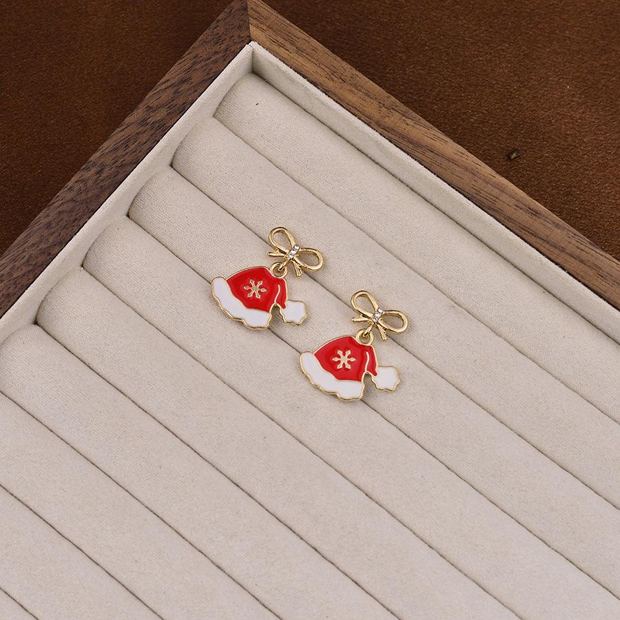 

Japanese & Korean Christmas Earrings: Bow, Snowflake, Tree & Candy Cane Designs