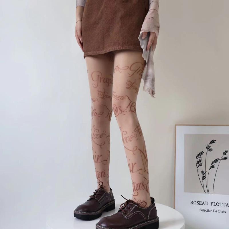 Sexy kvinner engelsk trykt strømper mørk punk sommerfugl hudfarge tatovering jumpsuit strømpebukser cosplay blonder fest fiskenett strømpebukser