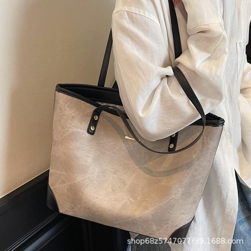 Large-capacity hand-held tote bag women's 2025 new trendy fashion leisure college student commuting shoulder bag for class