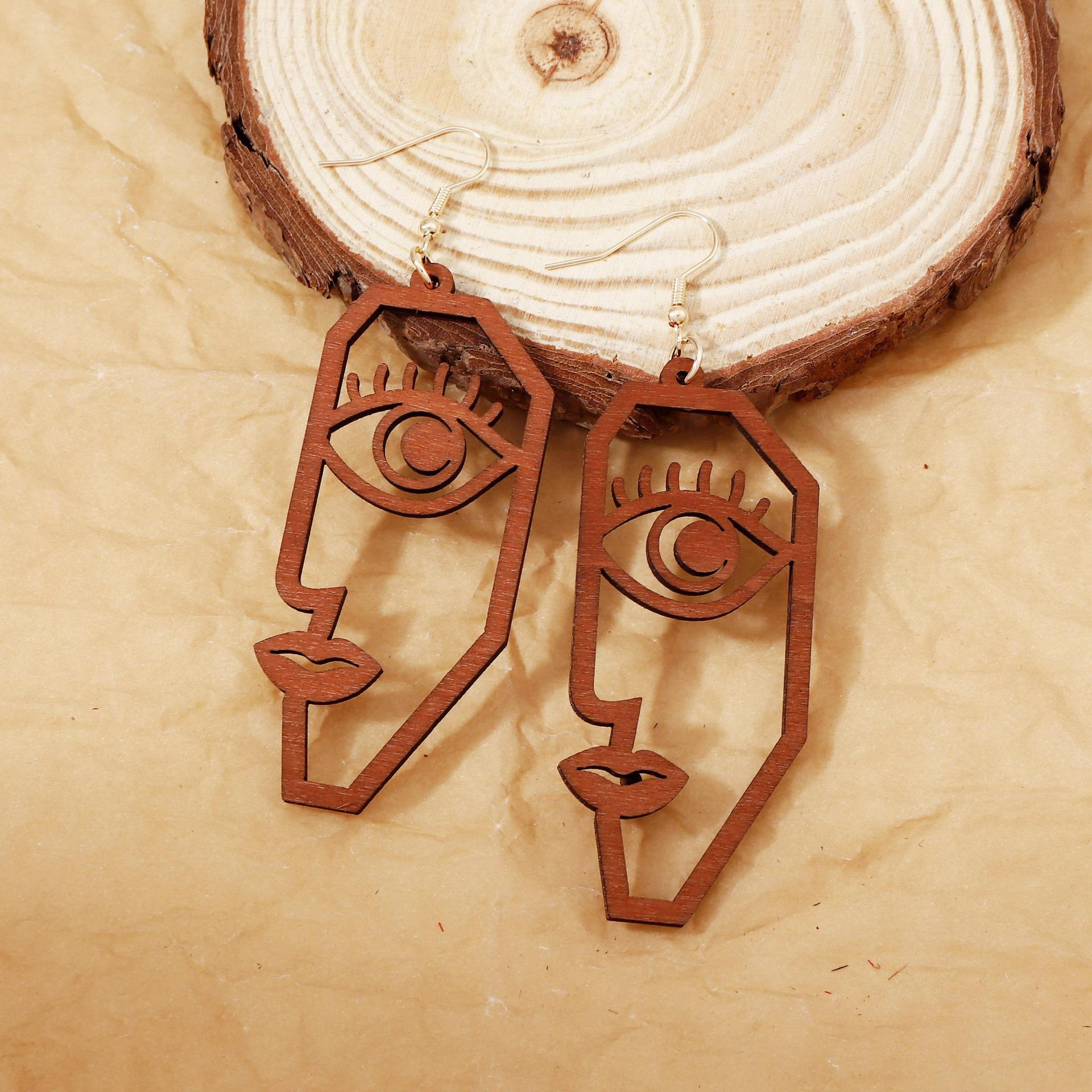 

Creative and fashionable design earrings for the face: Abstract wood-cut, fashionable, niche, versatile and novel style