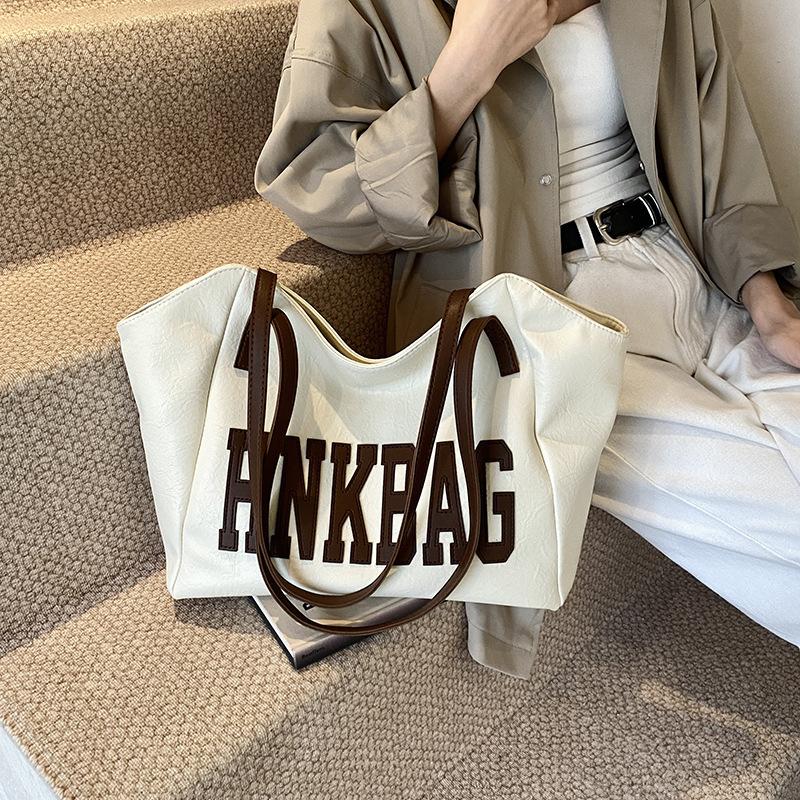 

Winter retro big bag women s 2025 trendy new niche design tote bag large capacity versatile shoulder armpit bag білий