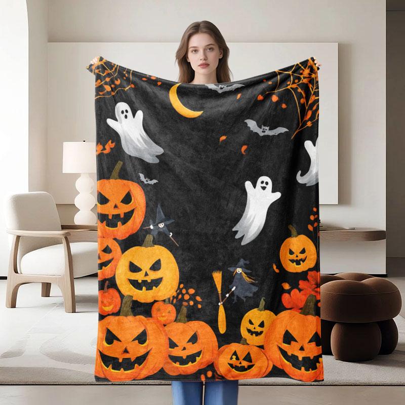 1 piece Halloween-themed black flannel blanket with orange pumpkins and ghosts, soft for sofa, bed, office, all-season use.