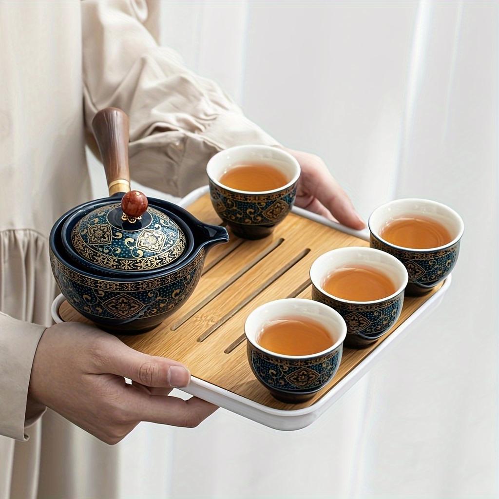 Creative Retro 360-Degree Rotating Tea Set One Pot And Four Cups Home Portable Kung Fu Travel Tea Set for Brewing Tea