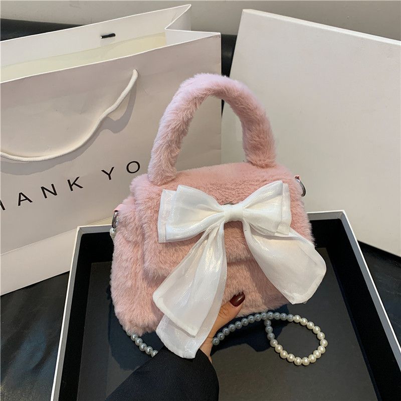 

Cute bow handbag bag women s 2025 winter new lazy plush beaded shoulder messenger bag розовый