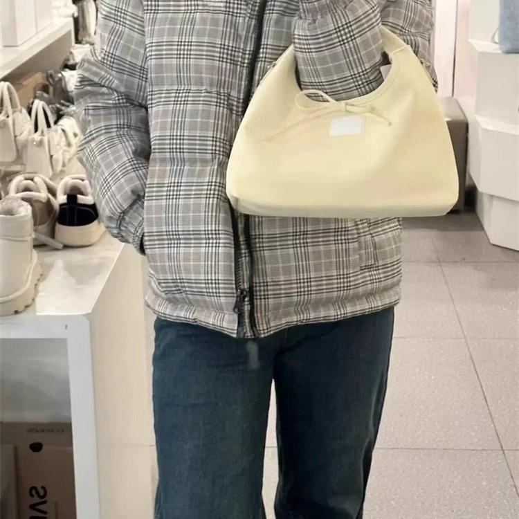 Gentle and sweet strap bow handbag spring new simple casual large-capacity dumpling bag