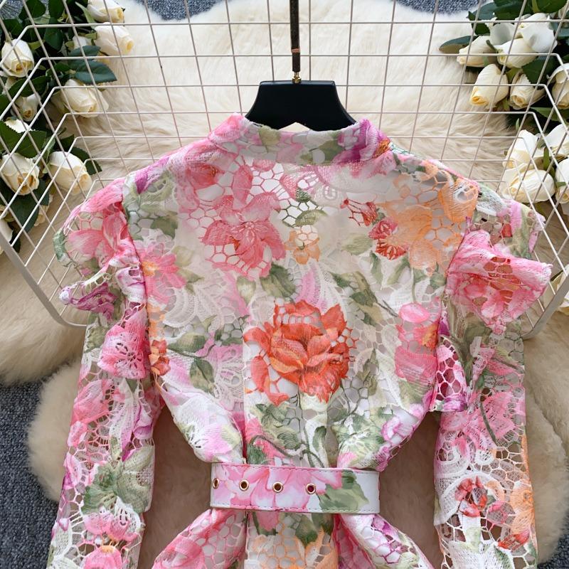 A Summer Women's Printed Dress with Flared Sleeves and Hollowed-out Crochet Design Featuring A Stylish Look