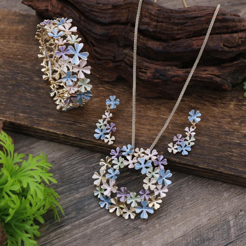 New enamel color hollow flower stud earrings pendant bracelet set women's autumn and winter high-end flower necklace