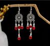 Peacock Tassel Earrings with Hollow Leaf Design in Retro Ethnic Style Imitation Silver for Women