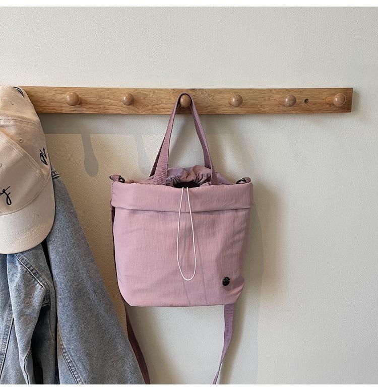 

Ручная холщовая маленькая сумка женская 2025 новая сумка-ведро повседневная на плечо сумка-мессенджер фиолетовый