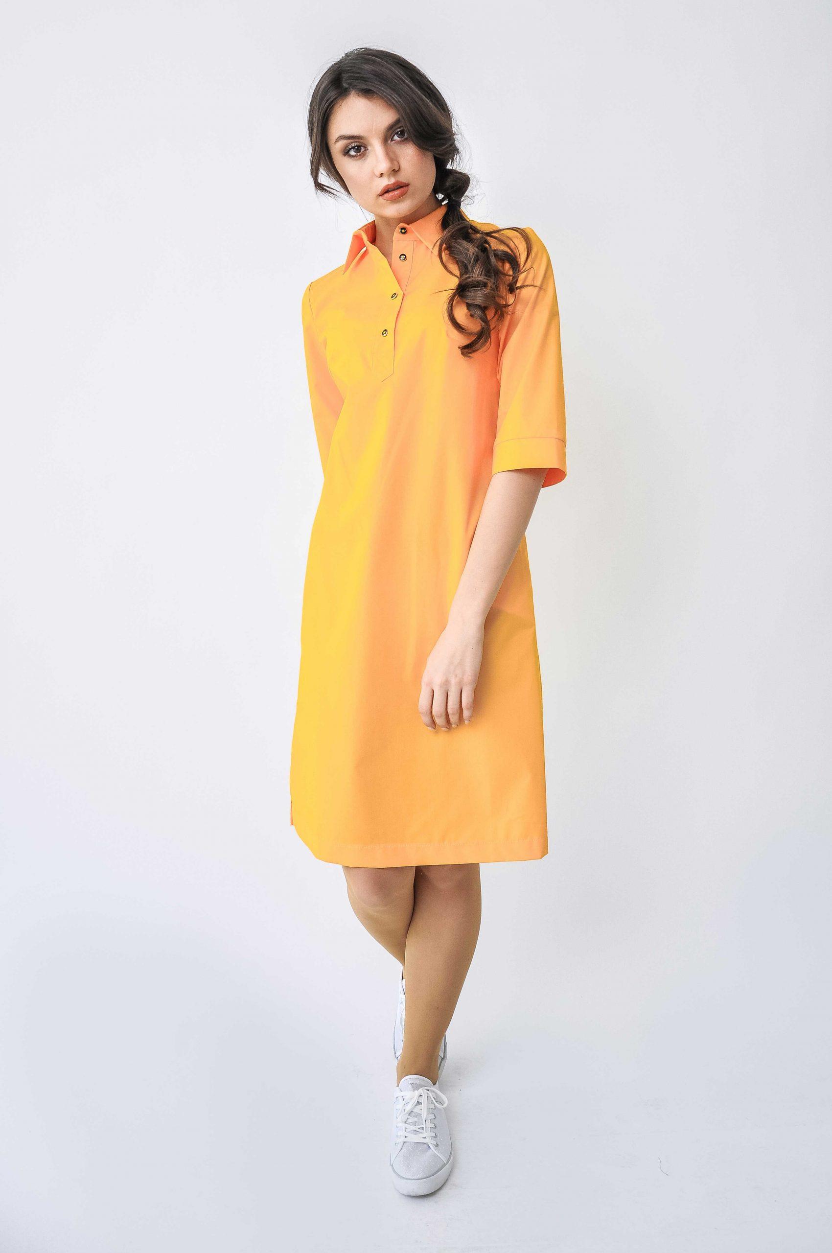 

Сукня сорочка прямого крою з невеликими розрізами по краях 42 бурштин