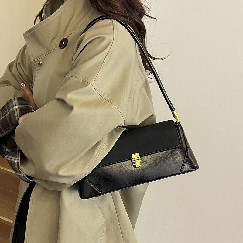 

Премиальная французская нишевая сумка 2025 новая трендовая сумка-багет для ношения в руке или под мышкой, универсальная на плечо, повседневная сумка-багет чёрный