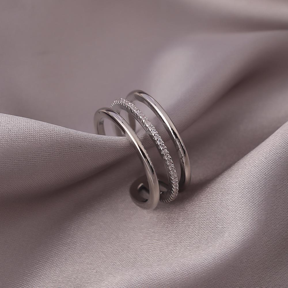 

Multi-layer Diamond-set Adjustable Women s Fashion Ring - High-end, Trendy, and Hot-selling. Copper Plated with Platinum