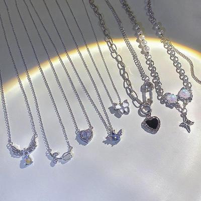Collana coreana in argento e titanio di alta gamma, versatile, con ciondolo a forma di farfalla e perla, per donna