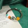 Original design woven Tibetan yellow honey bracelet men's and women's personalized Tibetan bracelet Nepalese style accessories