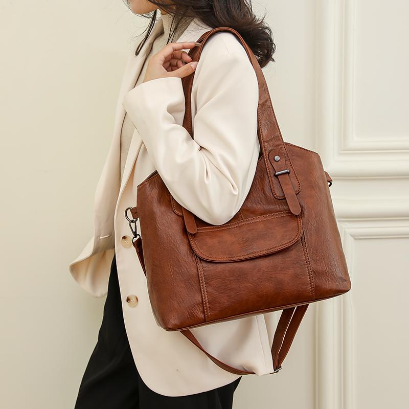 Elegant skulderveske i ensfarget PU-skinn for kvinner med glidelåslukking Polyesterfôret veske Allsidig veske til både jobb og hverdag