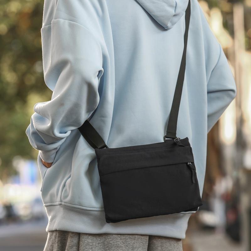 Tide brand messenger bag girls waterproof small square bag shoulder envelope bag summer mobile phone bag tooling locomotive bag men