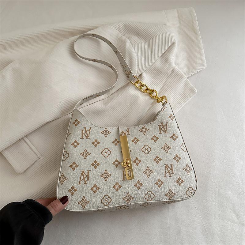 

Модная большая емкость, текстурный дизайн 2025 года, трендовый принт, замок, новая повседневная сумка-багет на одно плечо с цепочкой белый