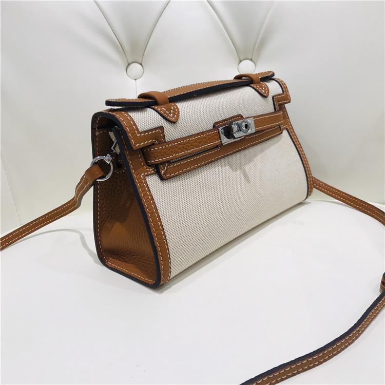 Nowej generacji płócienna torebka kopertówka ze skóry krowiej damska torba na ramię ukośny mała torba torba startowa