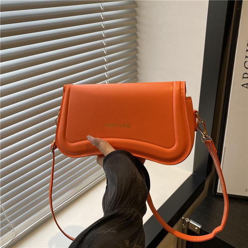 Textured hand-held underarm bag summer new fashion messenger bag solid color commuter retro shoulder bag women