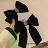 Nouvelles épingles à cheveux en velours noir avec nœud et ruban, élégantes pinces à cheveux camélia en tissu pour femmes, accessoires de coiffure tendance pour queue de cheval
