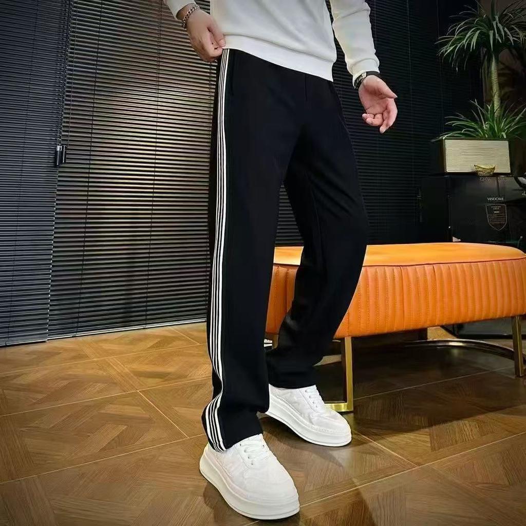 Autumn and winter senior sense splicing striped straight sports casual pants men's loose light luxury simple long-guard pants